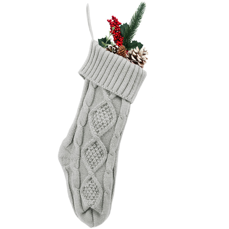 Weihnachtsstrümpfe – Der Weihnachtsmann legt Geschenke auf Socken