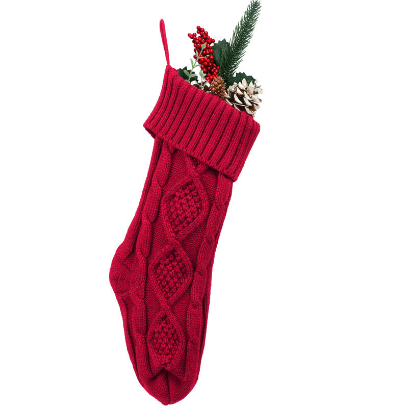 Weihnachtsstrümpfe – Der Weihnachtsmann legt Geschenke auf Socken